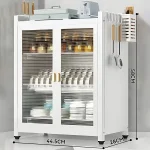 3 tier carbon steel kitchen rack with 2 drain trays in Sri Lanka, multifunction kitchen rack in Sri Lanka, dish storage organizer with doors, kitchen rack with pull out doors in Colombo, carbon steel kitchen shelf Sri Lanka, modern kitchen organizer with water trays, durable kitchen rack in Sri Lanka, dish rack with drainage trays, kitchen storage rack with magnet doors, kitchen cabinet alternative in Sri Lanka, Carbon Steel Dish Storage Organizer in Sri Lanka – 3 Tier Kitchen Rack with Pull Out Doors and Drain Trays