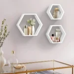 white floating shelves, hexagonal floating shelves, wall-mounted storage shelves, display shelves, modern wall decor, home office storage, wall shelves for living room, bedroom wall shelf, kitchen floating shelves, white hexagonal shelves, 3-piece floating shelf set, wall decor shelf, wooden wall shelves